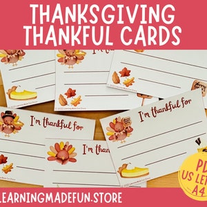 May include: Printable Thanksgiving thankful cards featuring a turkey, pie, and autumn leaves. The cards are designed for US Letter and A4 paper sizes. The text on the cards reads "I'm thankful for".