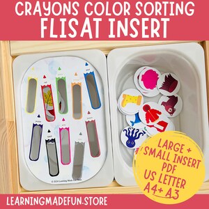 May include: Crayon color sorting activity for the FLISAT toy. The activity includes a white tray with 10 crayon-shaped slots and a separate white tray with 18 colorful circles. The circles feature various images, such as a boot, a bear, a leaf, and an octopus. The text "LARGE + SMALL INSERT PDF US LETTER A4+ A3" is printed on the bottom right corner of the image.