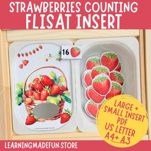 May include: A wooden learning toy with two compartments. One compartment has a picture of a basket of strawberries and a number 16. The other compartment has 16 individual strawberry images. The toy is labeled "Strawberries Counting Flisat Insert" and "Large + Small Insert PDF US Letter A4+ A3".