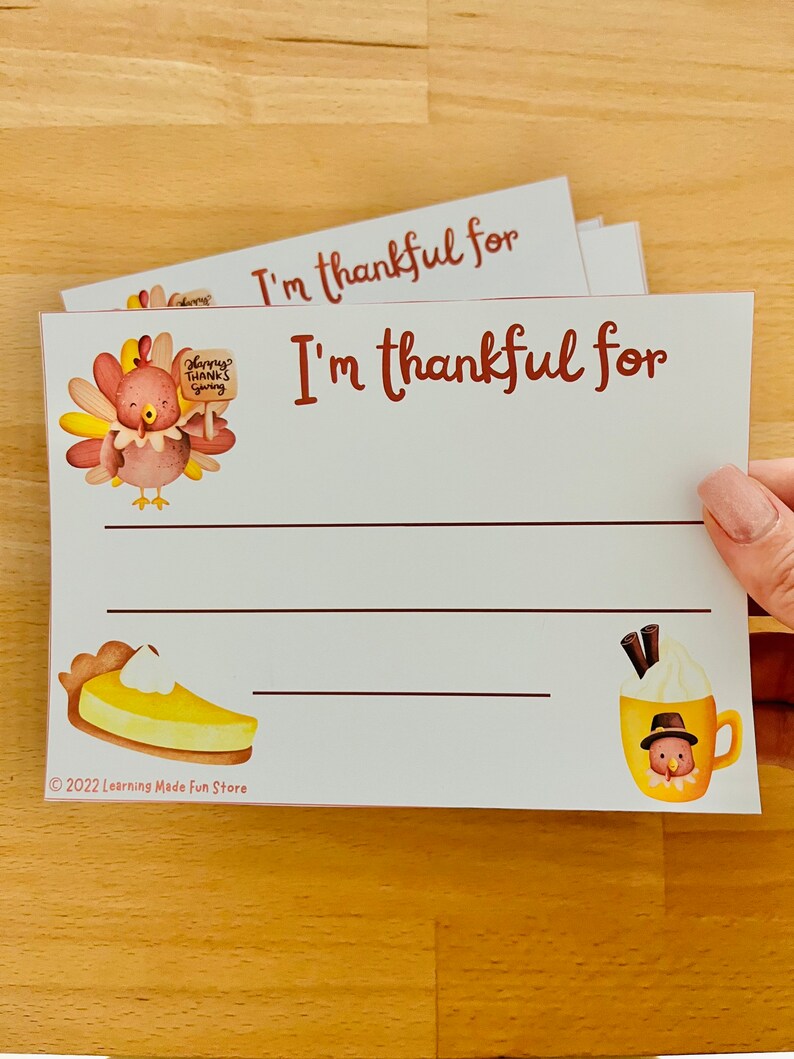 May include: A printable Thanksgiving activity sheet with a turkey illustration and the text "I'm thankful for". The sheet includes lines for writing and a pie and a cup of hot chocolate with a turkey on top.