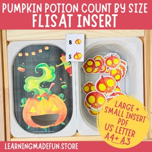 May include: A wooden toy shelf with two compartments. One compartment has a black chalkboard with a pumpkin illustration and the text "PUMPKIN POTION COUNT BY SIZE FLISAT INSERT". The other compartment has a white plastic container with orange and yellow pumpkin stickers. A white card with the numbers "8" and "5" and a pumpkin illustration is on the shelf. The text "LARGE + SMALL INSERT PDF US LETTER A4+ A3" is on a white circle.