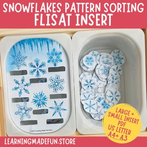 Pode incluir: Uma bandeja de plástico branca com um inserto de padrão de floco de neve azul e branco. A bandeja contém uma pilha de círculos brancos com padrões de floco de neve azul. O texto "LARGE + SMALL INSERT PDF US LETTER A4+ A3" está impresso em um rótulo branco.