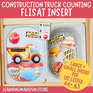 May include: Construction truck counting activity for a FLISAT insert. The activity includes a truck, construction signs, cones, and a hard hat. The activity is designed for children to count the objects and match them to the numbers on the cards. The activity is printed on US letter size paper and is available in A4 and A3 sizes.