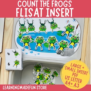 May include: A printable frog counting activity for kids. The image shows a set of frog cutouts, a wooden frame, and number cards. The text on the image reads "Count the Frogs Flisat Insert, Large + Small Insert PDF, US Letter A4+ A3".
