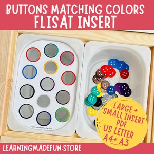 May include: A white plastic tray with a colorful button sorting activity. The tray has 15 circles with different colored borders. A separate white plastic container holds a variety of colorful buttons. The text on the image reads "Buttons Matching Colors Flisat Insert Large + Small Insert PDF US Letter A4+ A3 LearningMadeFun.Store".
