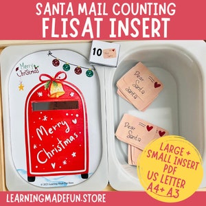 以下が含まれることがあります： 赤い白のクリスマスの郵便受けにベルと「メリークリスマス」の文字が書かれています。郵便受けは子供向けの計算活動の一部です。白い容器の中に「サンタさんへ」と書かれた小さなカードが10枚入っています。カードはFLISATインサート用です。画像には「LARGE + SMALL INSERT PDF US LETTER A4+ A3」のテキストも表示されています。