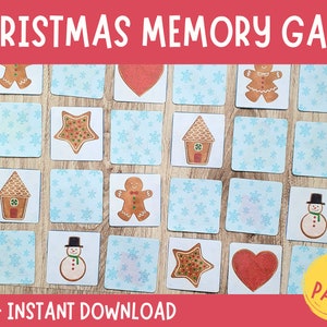 Puede incluir: Un juego de memoria de Navidad con 24 pares de cartas que muestran imágenes de casas de jengibre, hombres de jengibre, estrellas de jengibre, muñecos de nieve y corazones. Las cartas están dispuestas sobre una superficie de madera. El texto "24 PAIRS" está en la esquina inferior derecha de la imagen.