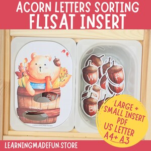 May include: A printable PDF download for a fall-themed letter sorting activity. The printable features a cute cartoon bear in a barrel with acorns and the letters W, F, and B. The printable is designed to fit a FLISAT insert.