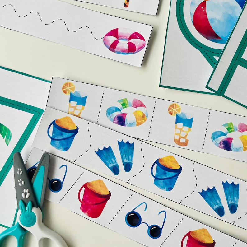 May include: A set of printable summer-themed activity cards for kids. The cards feature images of a beach bucket, sunglasses, flippers, a life preserver, and a glass of lemonade. The cards are designed to help children learn about summer activities and vocabulary.