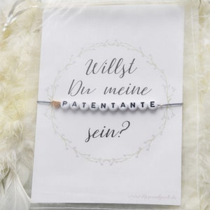 Pulsera y tarjeta de petición de madrina en bolsa de organza