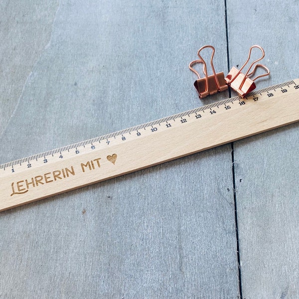 Wooden ruler engraves teacher with heart