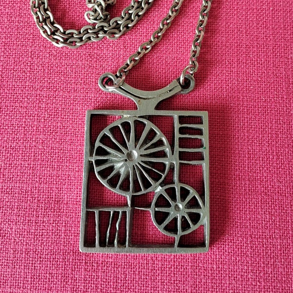 TYR Vintage Pewter Pendant Necklace. Rock Carving Inspired Pattern with Sun Wheels. Designed by R. Landerholm for TYR Börje Wicksell AB.