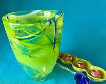 Anna Ehrner Glass Vase. Made by Kosta Boda Sweden. Swirls in Lime Green, Blue and White. Very Heavy. Good condition. Original Label.