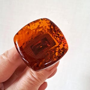 2 Glass and Brass Cabinet Knobs. Furniture Knobs. Amber Glass. Door Knobs. Square Shape. 1960s. Sweden.