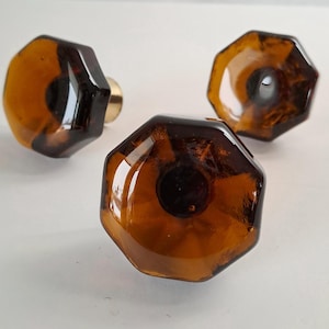 3 Vintage Glass Cabinet/Furniture Knobs. From 1960s. Dark Amber Glass with Brass. Sweden "Verrina".