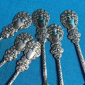 6 Silver Plated Coffee Spoons. Swedish Tea Spoons. Made in the 1950&#39;s. Heraldic Pattern on Top. Marked with Ex.Pr.N.S.Alp. Unusual Design.