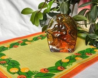 2-piece Easter set. "Lindshammar" amber coloured glass ornament and a hand printed linen table runner signed with Hilja.