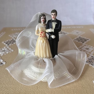 Vintage Wedding Cake Topper. 1960&#39;s. Bride and Groom. Plastic and Polyester Lace. Yellow Dress and Tuxedo. Hand Painted. Wedding Couple.