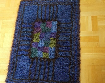 Cobalt blue Swedish wool "rya" rug from the 1960's. Hand crafted by knotting. Typical design with squares from the mid-century.