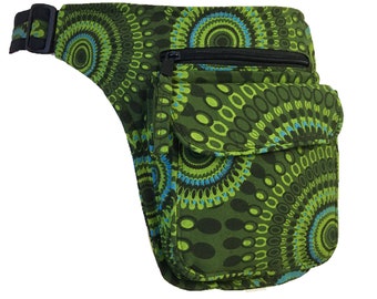 May include: A green fanny pack with a zippered pocket and a black adjustable belt. The fabric has a circular pattern with green, blue, and black colors.
