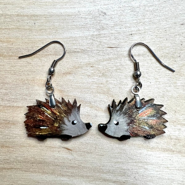 Hedgehog earrings original art and hand painted. Gift bag included. A donation from every sale is made to Rachel’s Hedgehog Hotel, Norfolk