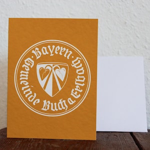 Wenskaart "Buch am Erlbach Wappen" (restantvoorraad kerstmarkt) - Groeten uit Neder-Beieren | Hoogwaardig FineArt Hahnemühle-papier