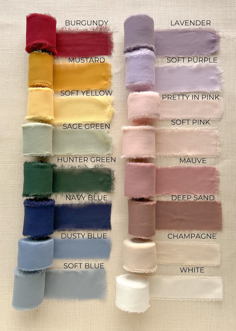 May include: A collection of 16 different colored silk ribbon rolls with frayed edges. The colors are burgundy, lavender, mustard, soft purple, soft yellow, pretty in pink, soft pink, sage green, hunter green, mauve, navy blue, deep sand, dusty blue, champagne, soft blue, and white.