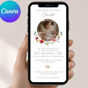Könnte beinhalten: Ein Smartphone-Bildschirm zeigt eine digitale Taufeinladung für Charlotte. Das Design umfasst ein kreisförmiges Foto eines Kindes, eine florale Kranzillustration und deutschen Text mit Datum, Uhrzeit und Ort der Zeremonie sowie der Feier.