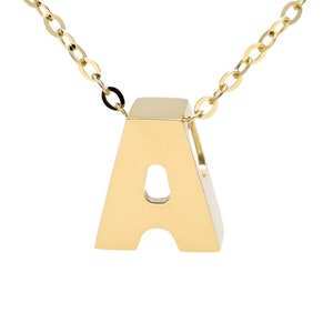 May include: A gold chain necklace with a large, gold, letter A pendant.
