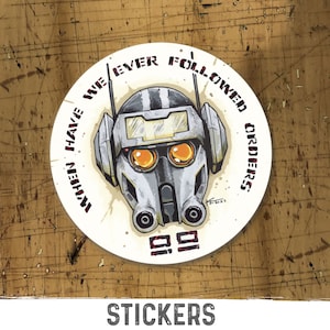 May include: Round sticker featuring a detailed illustration of a robot head with orange eyes and the text "WHEN HAVE WE EVER FOLLOWED ORDERS" in a circular pattern. The sticker also has the text "99" and the word "STICKERS" at the bottom.
