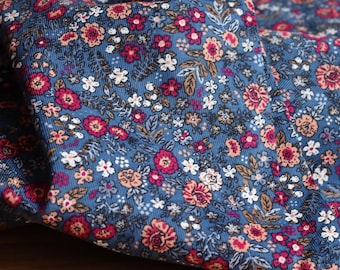 Corduroy fabric with floral print, 140 g/m², blue, perfect for trousers, skirts, dresses, OEKO-TEX certified.