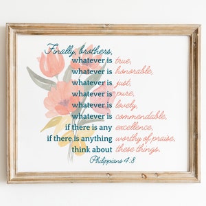 May include: A framed print with a watercolor floral design and a quote from Philippians 4:8. The quote reads: "Finally, brothers, whatever is true, whatever is honorable, whatever is just, whatever is pure, whatever is lovely, whatever is commendable, if there is any excellence, if there is anything worthy of praise, think about these things."