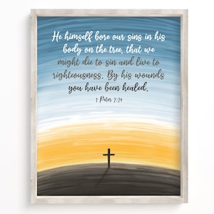 May include: A watercolor painting of a sunset with a cross silhouetted against the horizon. The painting includes the text "He himself bore our sins in his body on the tree, that we might die to sin and live to righteousness. By his wounds you have been healed. 1 Peter 2:24"