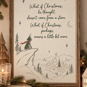 May include: A framed wall art print featuring a line drawing of a green creature with a red scarf standing on a cliff overlooking a town. The text reads: What if Christmas, he thought, doesn't come from a store. What if Christmas, perhaps, means a little bit more.