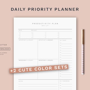 Puede incluir: Un planificador diario imprimible con una sección de plan de productividad, secciones importantes y urgentes, y listas de tareas para hoy y mañana. El planificador está en blanco y negro con un diseño simple. El texto "+2 CUTE COLOR SETS" está en la parte inferior de la página.