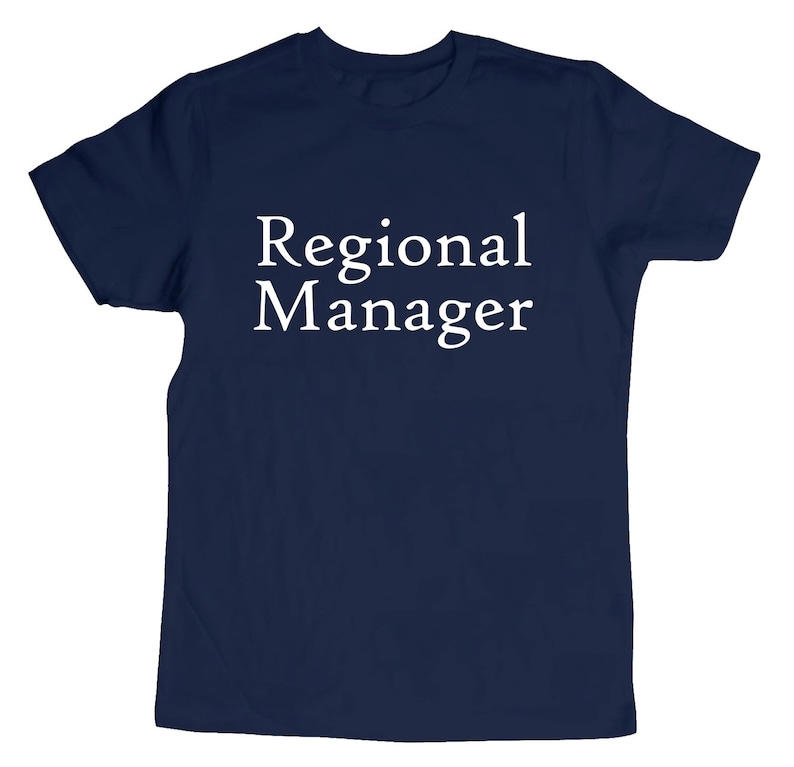 May include: A navy blue t-shirt with the text "Regional Manager" printed in white.