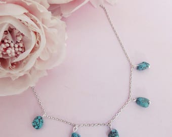 Collier RHEA
