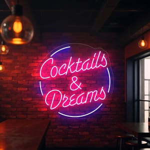 Neon sign featuring the phrase "Cocktails & Dreams" – the perfect LED light for cocktail bars, lounges, pubs, and home bars. This vibrant sign adds a fun and trendy touch to any space, making it ideal for nightlife venues, cocktail parties, and those who love to indulge in creative cocktails. A must-have for any bar or cocktail enthusiast looking to set the mood!