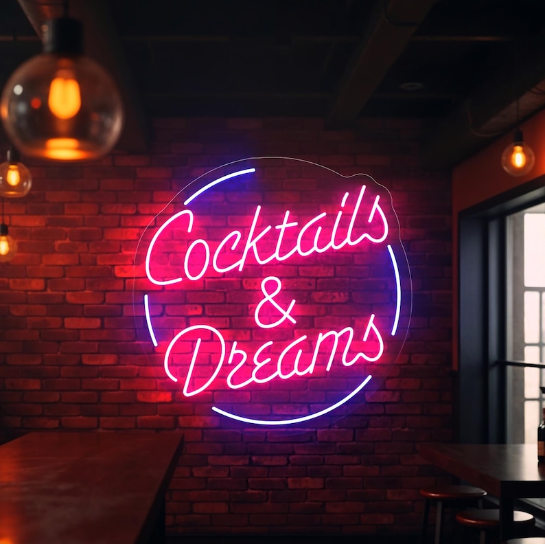 Neon sign featuring the phrase "Cocktails & Dreams" – the perfect LED light for cocktail bars, lounges, pubs, and home bars. This vibrant sign adds a fun and trendy touch to any space, making it ideal for nightlife venues, cocktail parties, and those who love to indulge in creative cocktails. A must-have for any bar or cocktail enthusiast looking to set the mood!