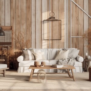 May include: A white sofa with throw pillows and a blanket sits in a living room with a wooden wall, a wooden coffee table, a wooden chair, and a large window. The room is decorated with plants and a lantern. The text "FULL HEARTS" is visible in the lower right corner of the image.