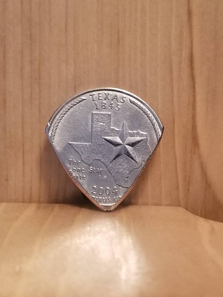 Quarter 2024 guitar pick