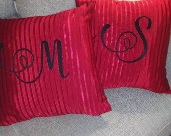 Monogram pillows with Asian print  back panel.
