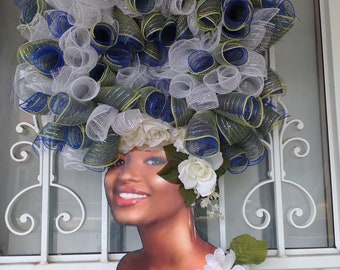 Diva Wreath Front Facing White, Blue and Green Mesh, Wreath is 30 inches long and 25 inches wide. Made in 14 inch wire wreath form.