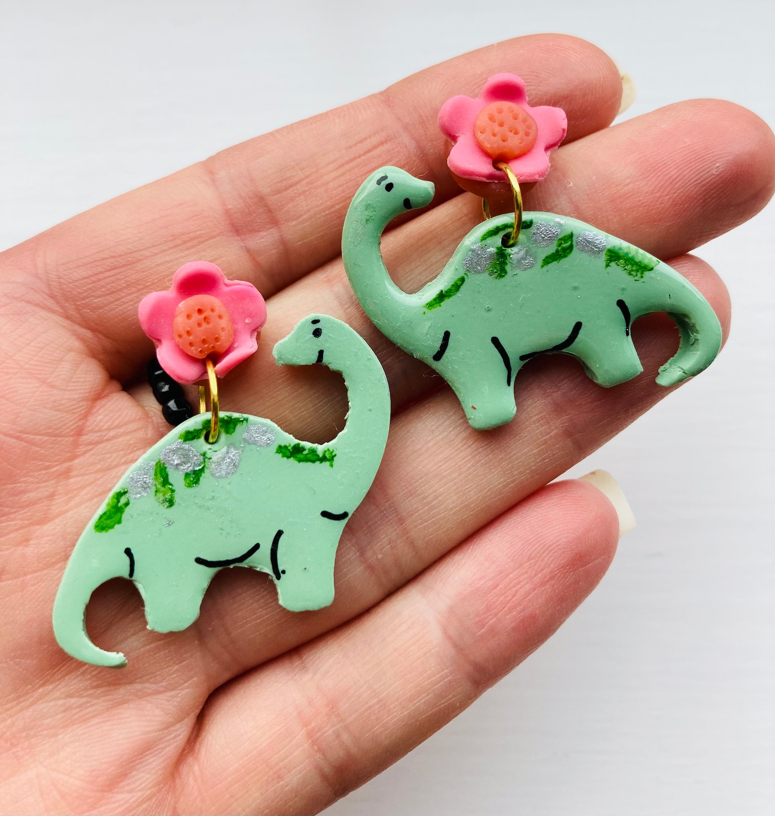 Dinosaur designs earrings Clearance