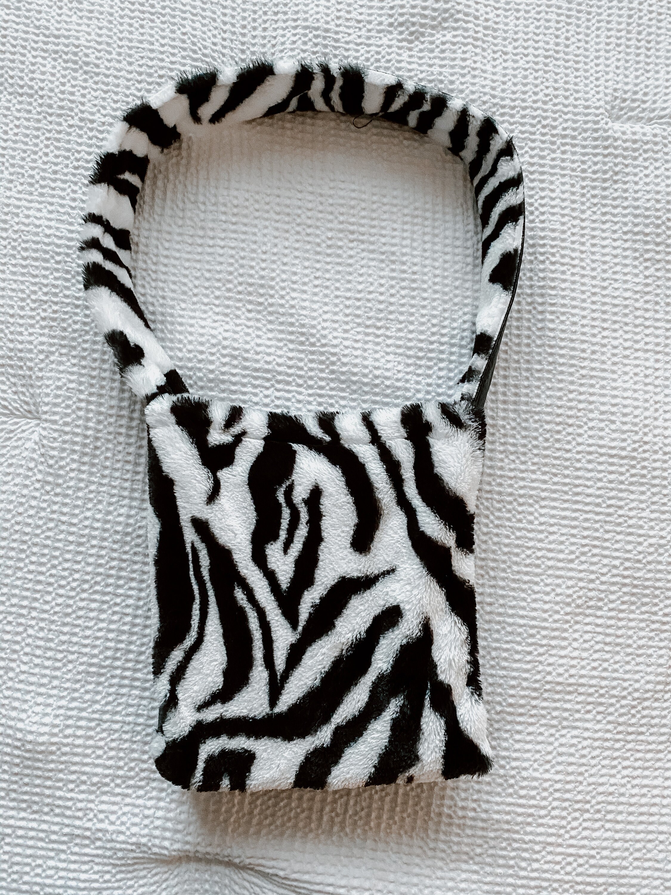 small black fluffy bag