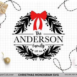 May include: A black and white Christmas wreath with a red bow and the text "The Anderson Family Est. 2020".