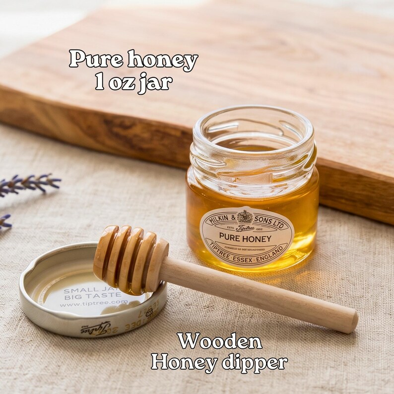 a jar of pure honey and a wooden honey dipper on a wooden surface.