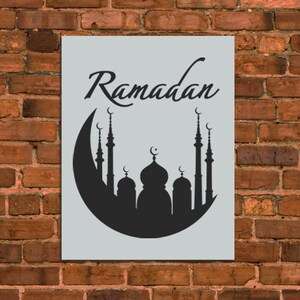 May include: A black and white silhouette of a mosque with minarets and a crescent moon on top. The text "Ramadan" is written in a decorative font above the mosque.