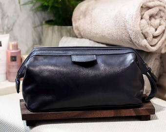 Neceser de viaje de cuero con kit de aseo