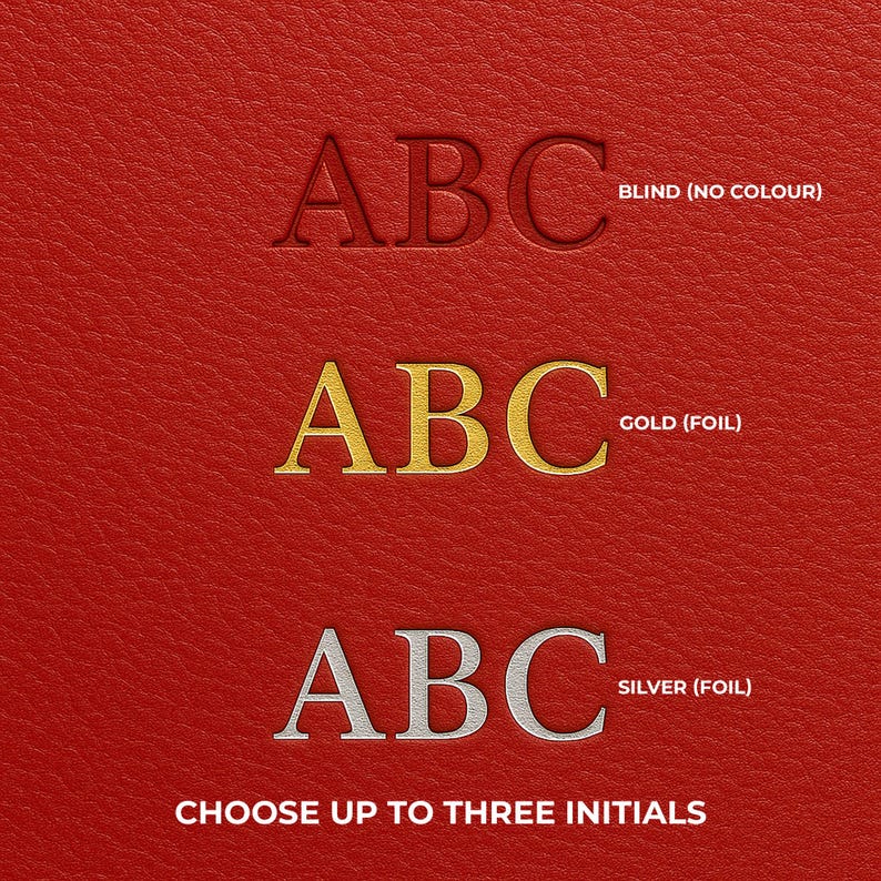 May include: A red textured surface displaying three rows of the letters ABC. The top row is blind embossed, the middle row is in gold foil, and the bottom row is in silver foil. Text labels indicate BLIND (NO COLOUR), GOLD (FOIL), SILVER (FOIL), and CHOOSE UP TO THREE INITIALS.